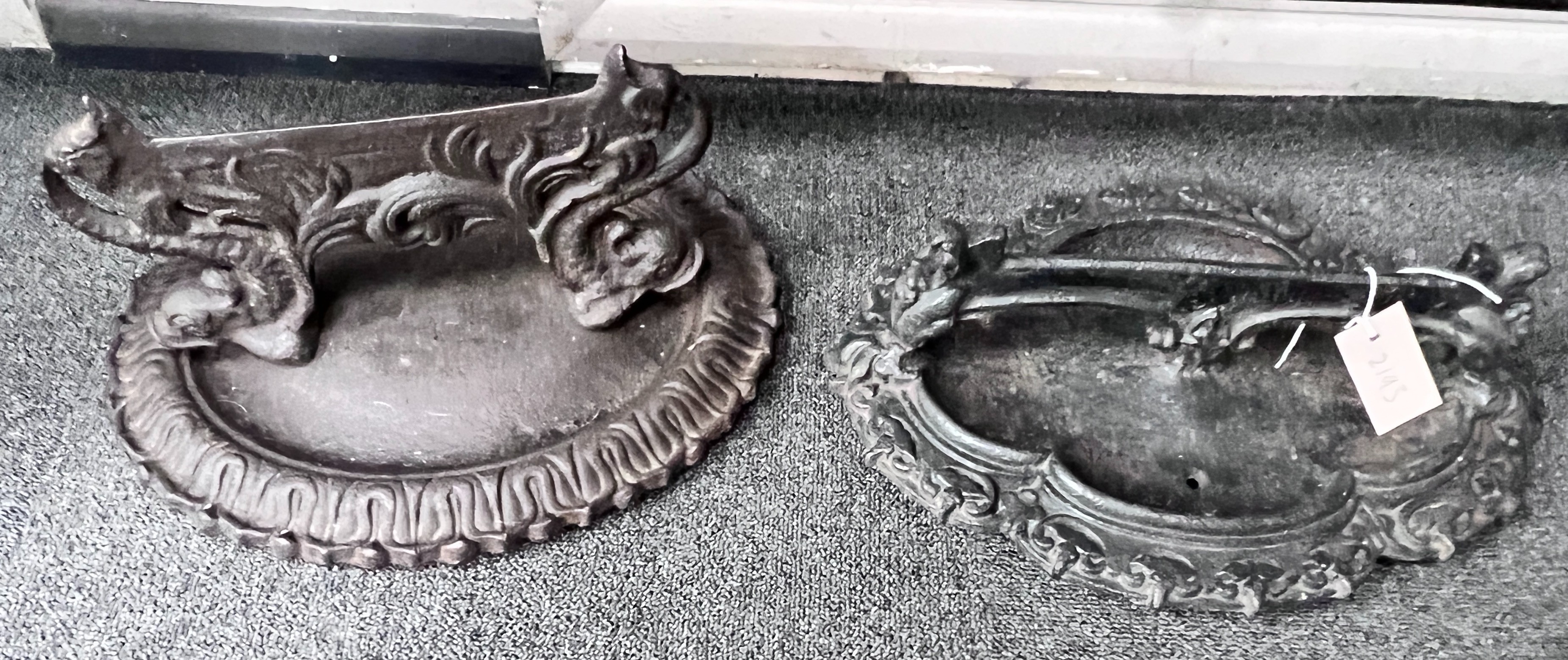 Two Victorian cast iron boot scrapers